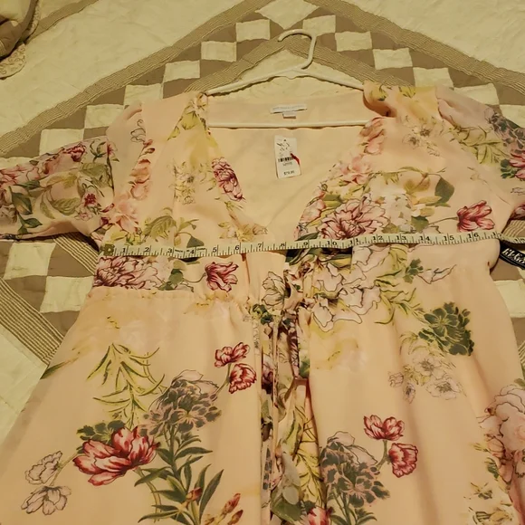 Nwt. Stunning, gorgeous dress. High low. Ruffles. Very feminine. Elastic waist - Picture 12 of 16